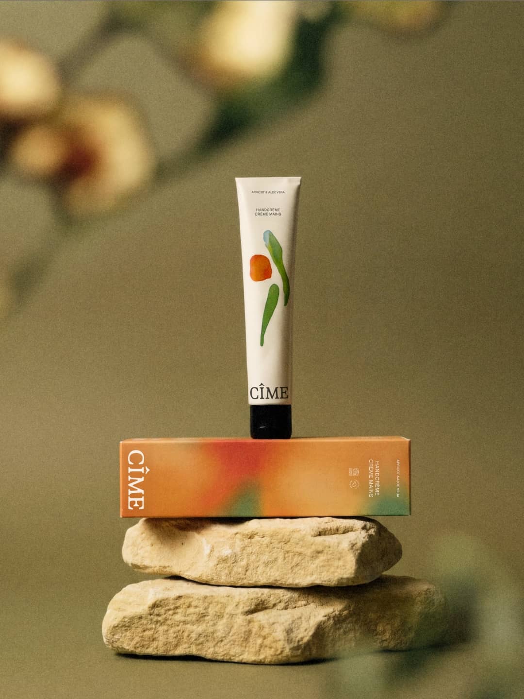 cime-ai-hand-cream-tube-on-stones-the-phoney-club
