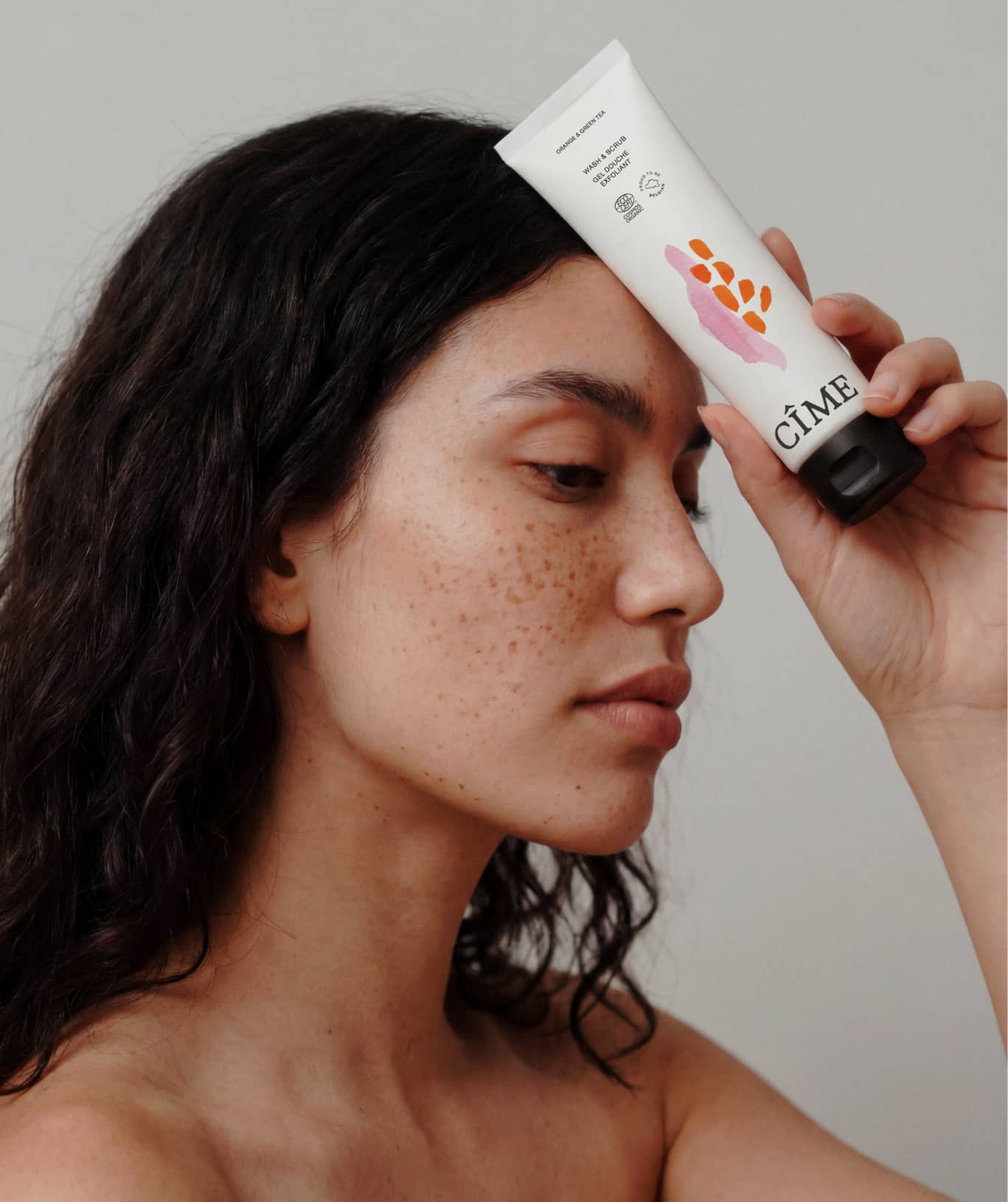 cime-skincare-model-with-tube-the-phoney-club